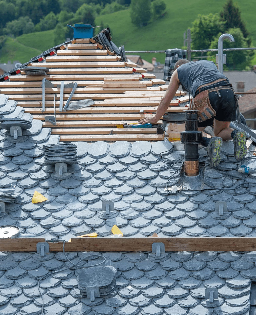 roof repairs ongoing on a tile roof