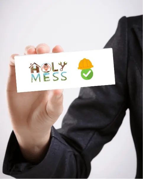 man holding holymess repairs card