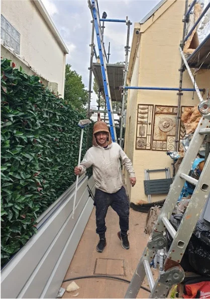 Holymess repairs happy roofers at work