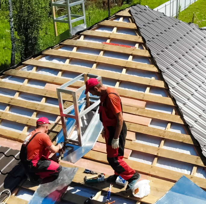 local roofers doing restoration on a roof